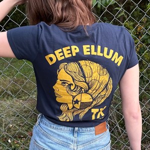 Back of Romanian Girl t-shirt with stylized silhouette of a girl printed in gold on black fabric