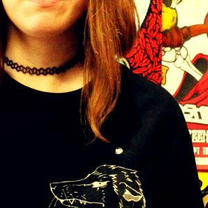 Woman in black Punk Possum Tee Shirt